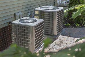 Two outdoor AC condenser units