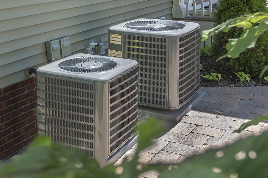 Two outdoor AC condenser units