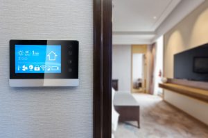 Smart thermostat controlling North Valley home heating and cooling system indoors