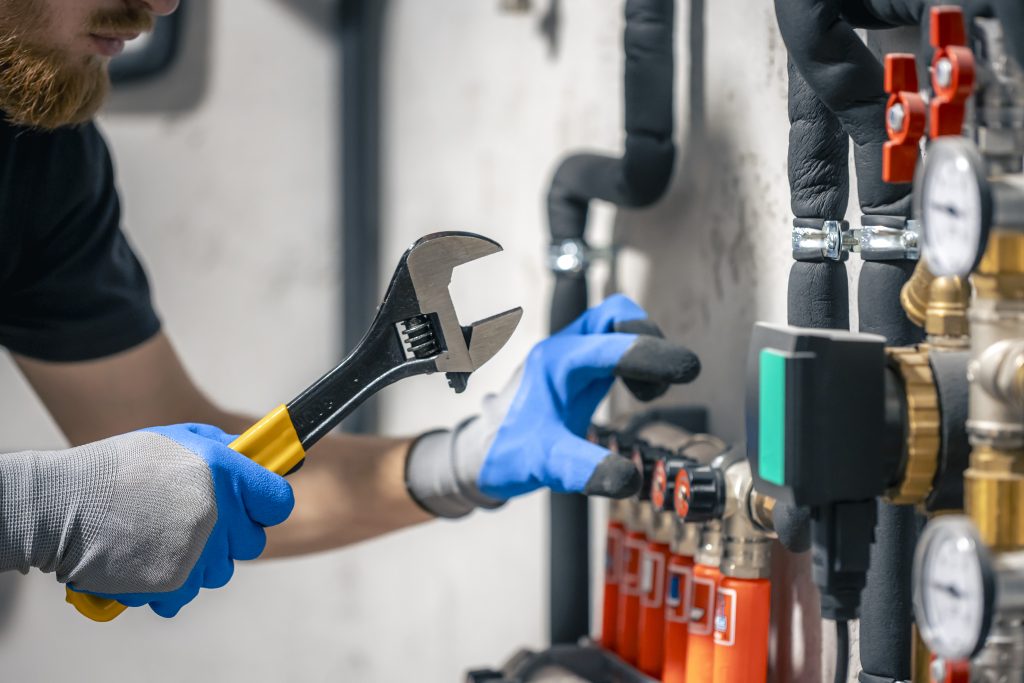 Repiping services technician replacing water lines in Albuquerque, NM